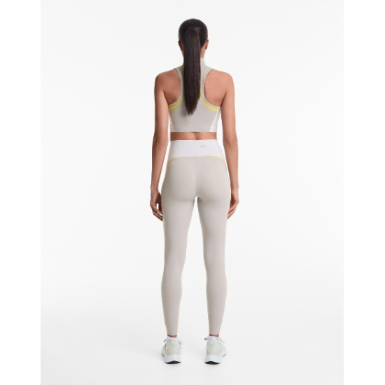 توب رياضي أنيق بلون موحد Bloklu Active Elegance Top من Oysho