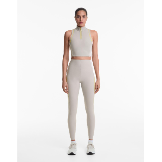 توب رياضي أنيق بلون موحد Bloklu Active Elegance Top من Oysho