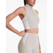 توب رياضي أنيق بلون موحد Bloklu Active Elegance Top من Oysho